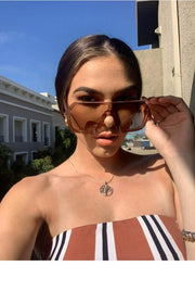 ÉÌƷͼƬ 41 | B0854JYPB2 | FEISEDY Classic Siamese One Piece Sunglasses Nice Rimless Stylish Retro Design for Women Men B2574